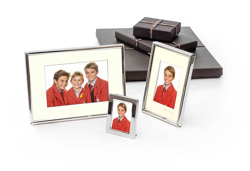 Photograph of 3 silver plated frames